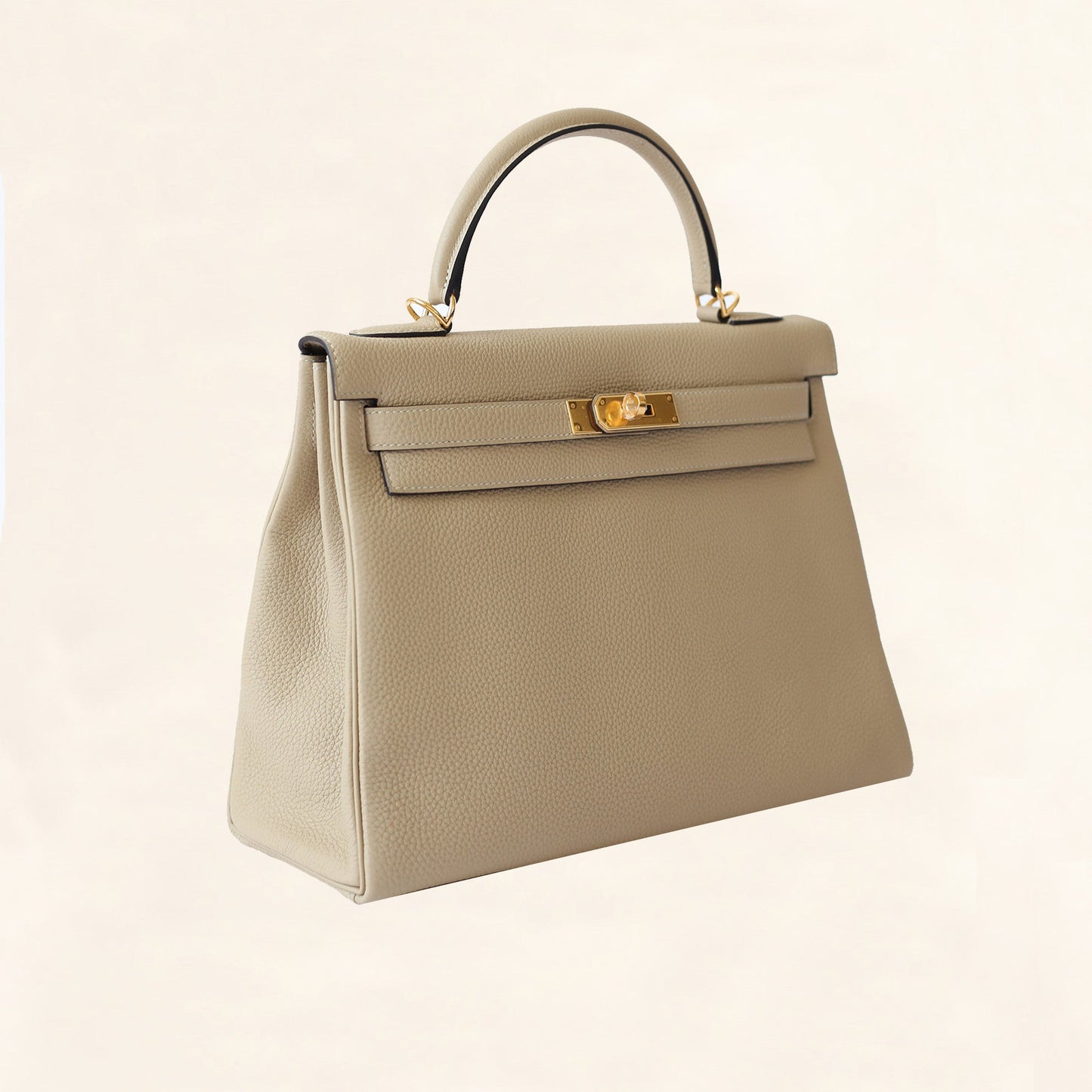 Hermès | Trench Togo Retourne Kelly - Gold Hardware | 32