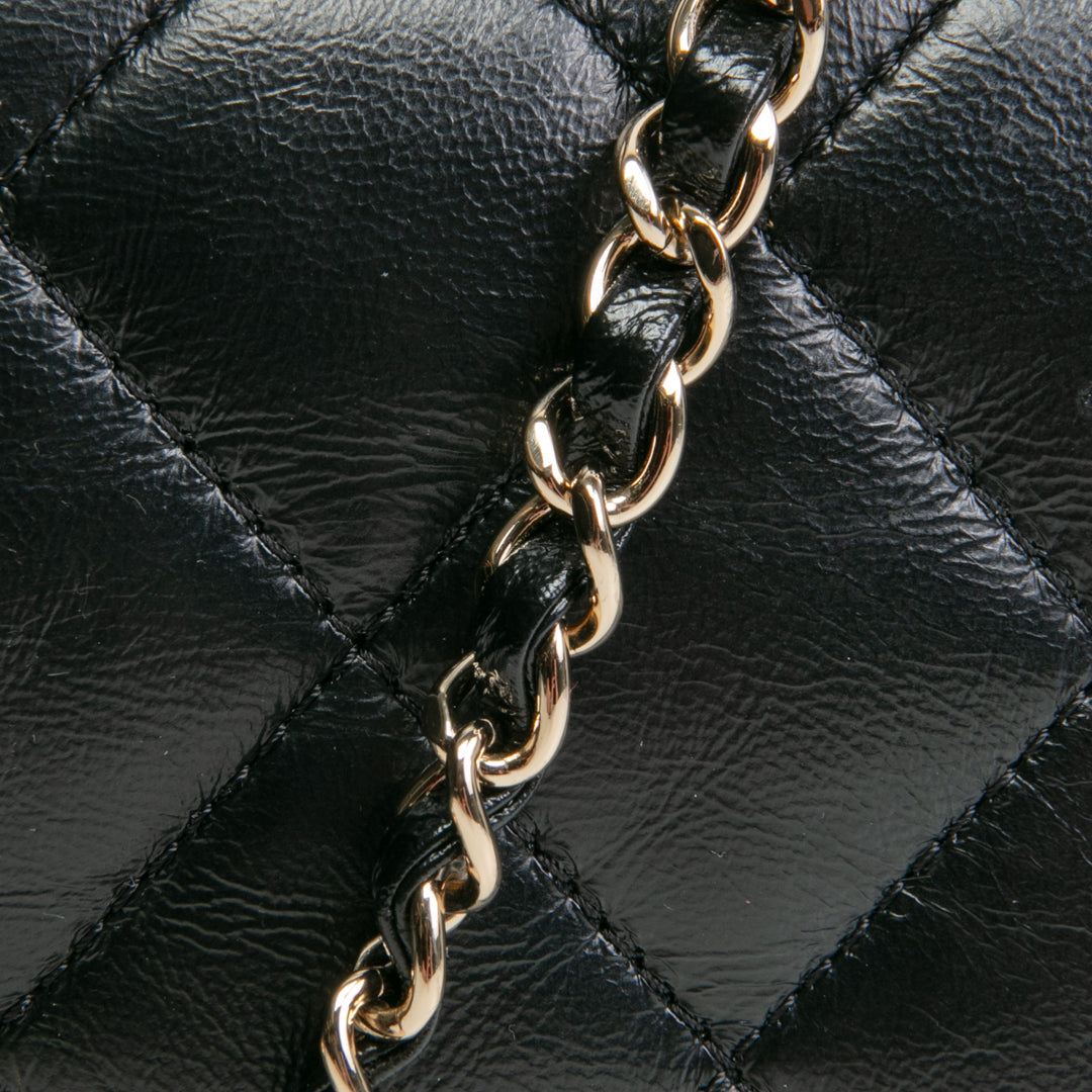 CHANEL Quilted Crinkled Leather Coco Top Handle Flap Bag - Black