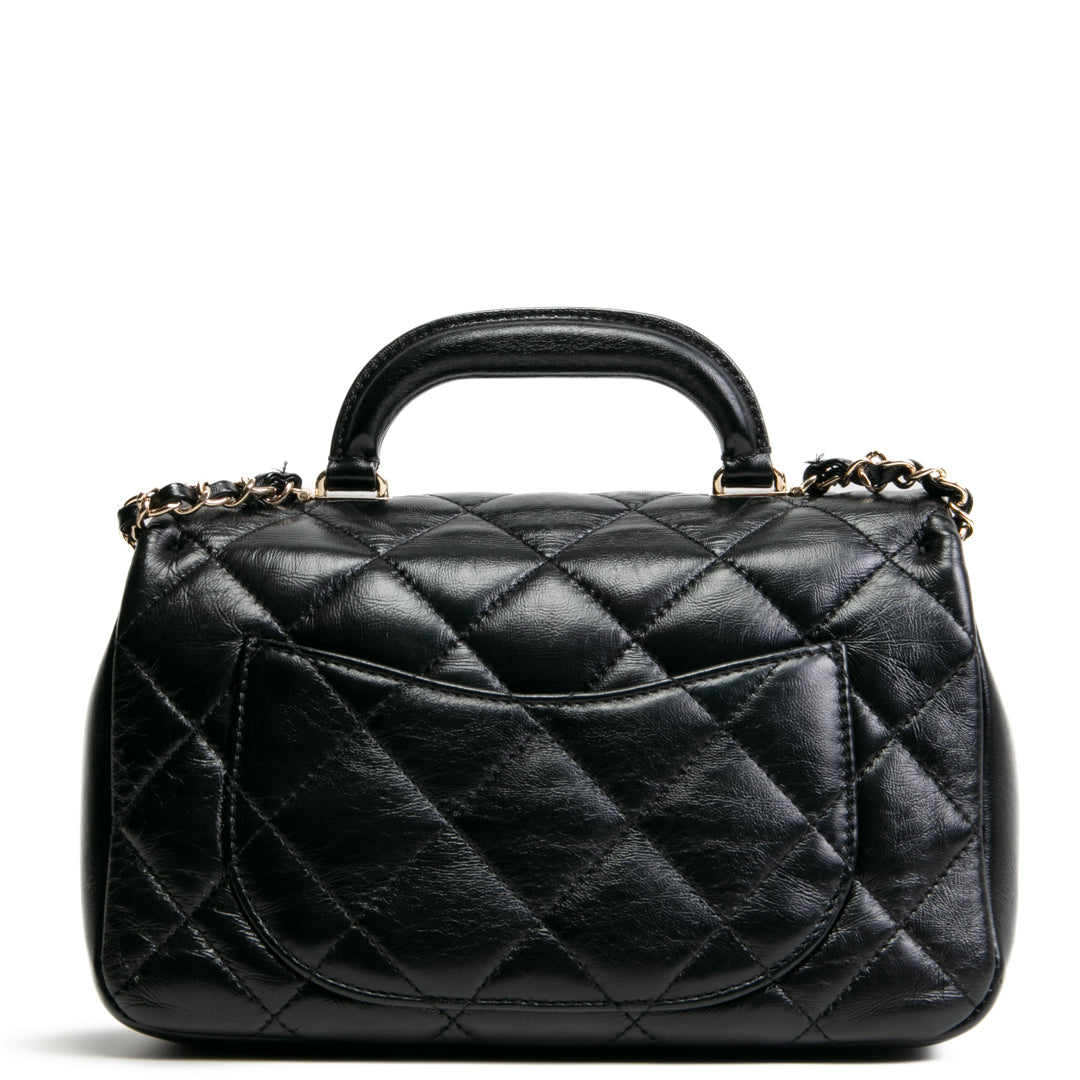 CHANEL Quilted Crinkled Leather Coco Top Handle Flap Bag - Black