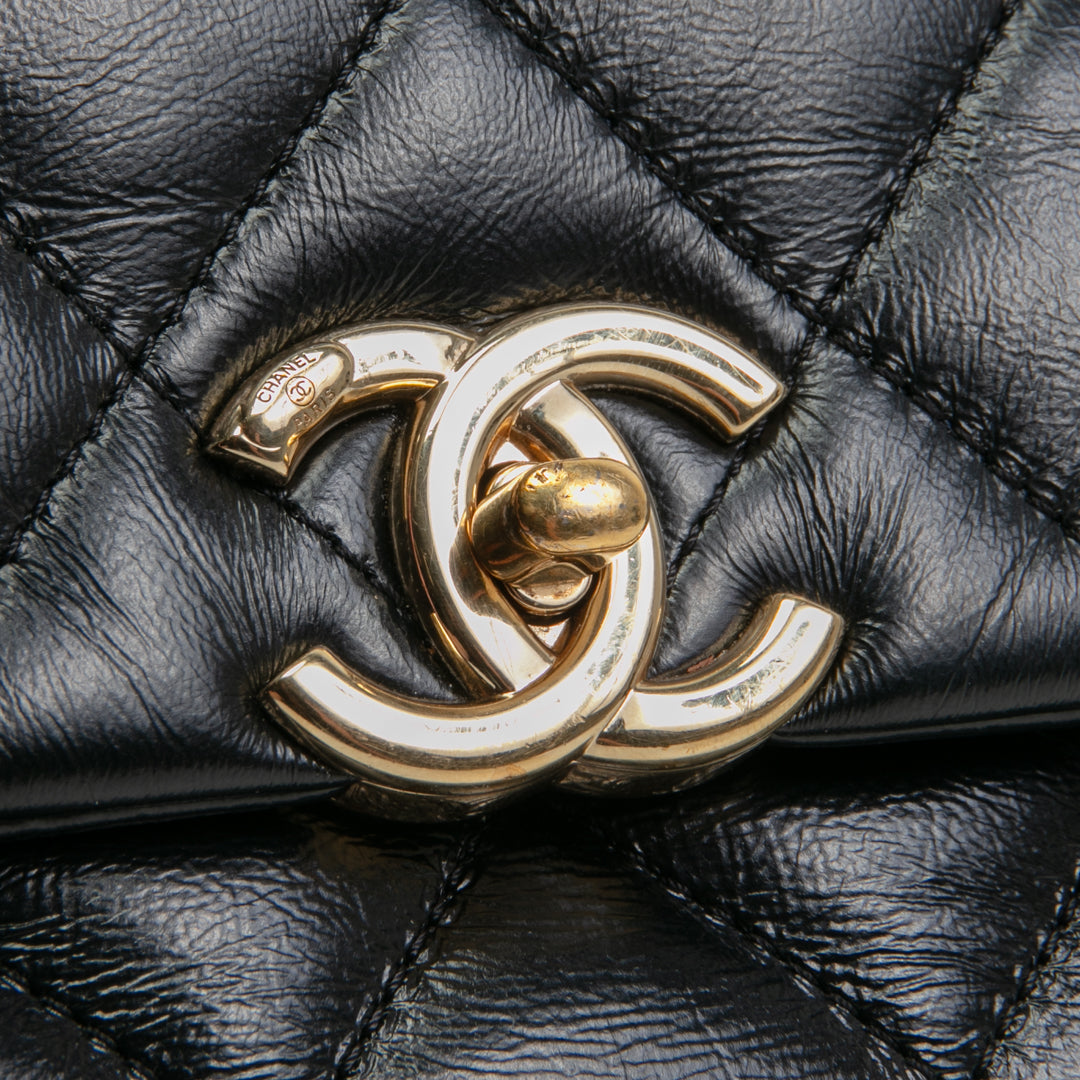 CHANEL Quilted Crinkled Leather Coco Top Handle Flap Bag - Black